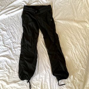 Size 8 black lululemon midrise unlined studio pant.